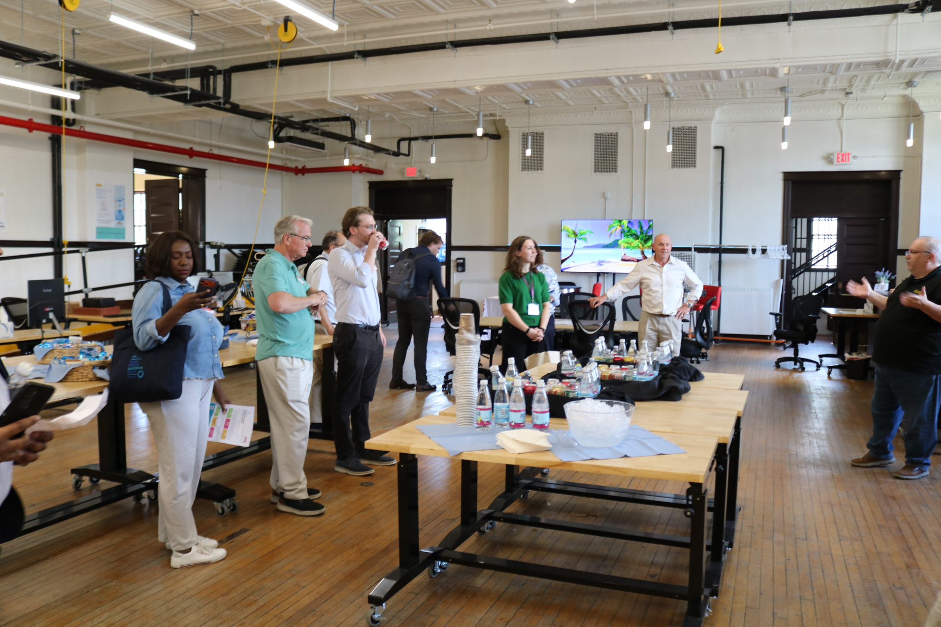 Attendees networking during a stop on the incubator bus tour